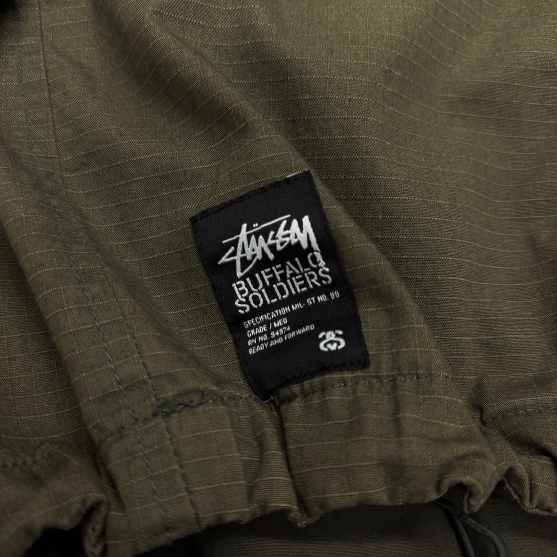 스투시 X 버팔로솔져스 인터네셔널 밀리터리 페이딩 풀오버 테크니컬 자켓 상품이미지7