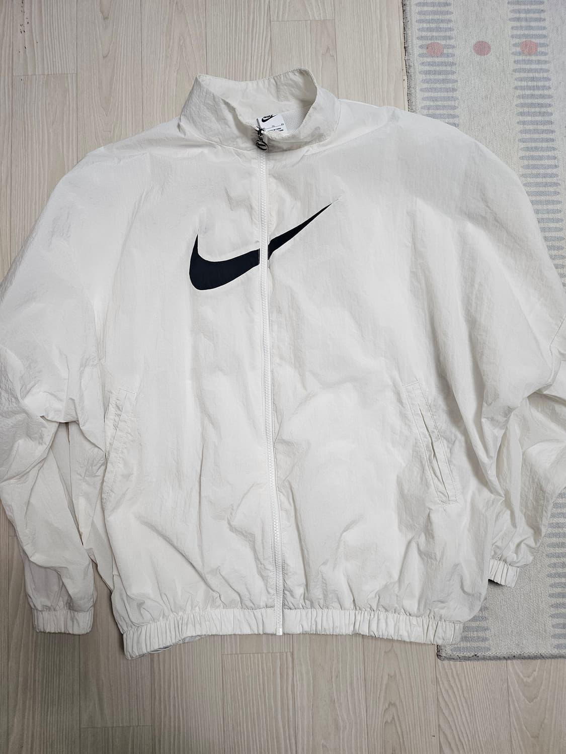 나이키 스우시 우븐 바람막이 상품이미지1