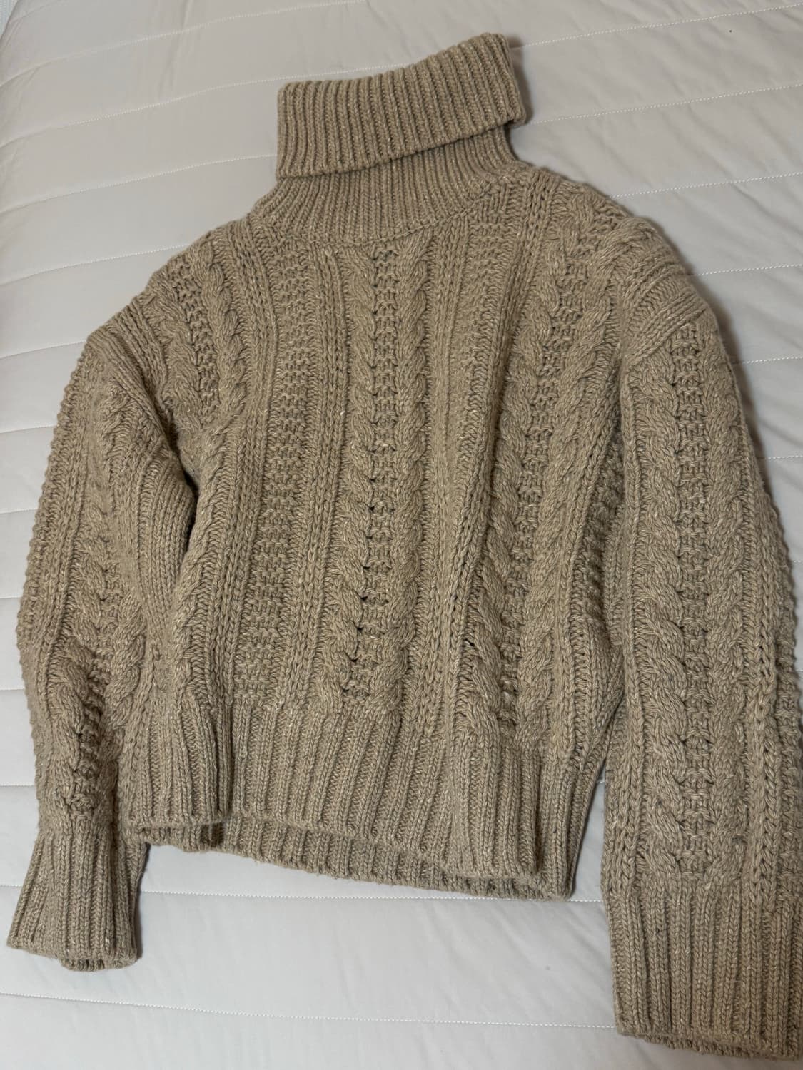 쎄르토 목폴라 니트 상품이미지1