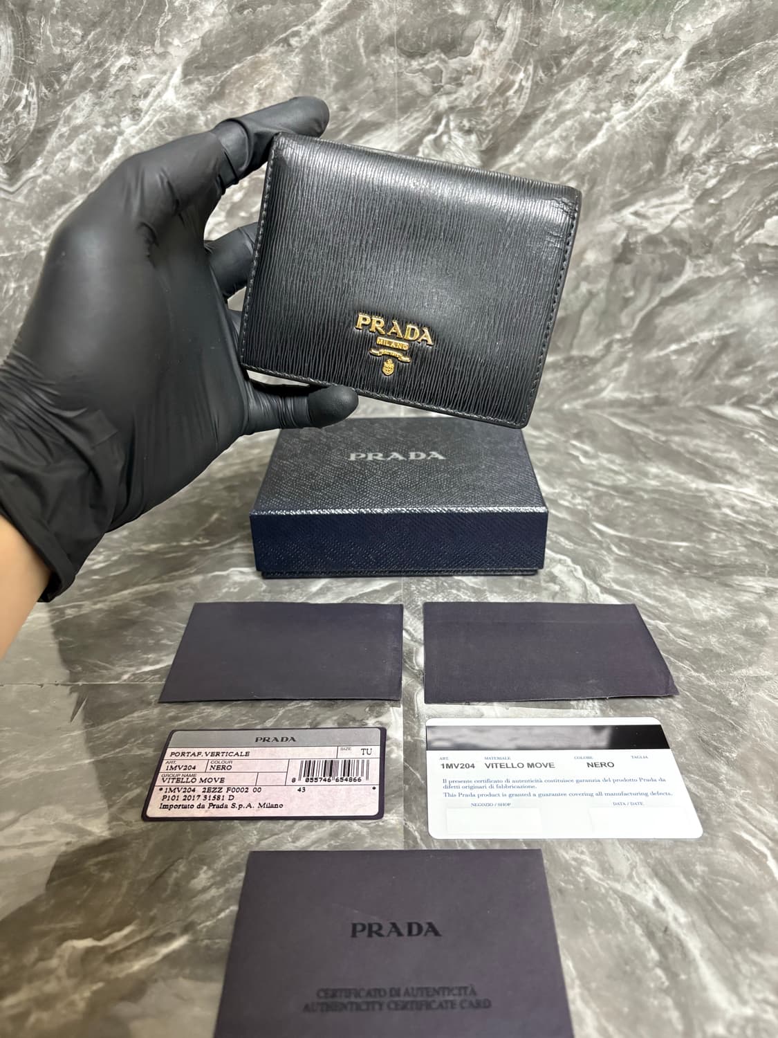 프라다 비텔로 무브 카프스킨 금장로고 반지갑 상품이미지1