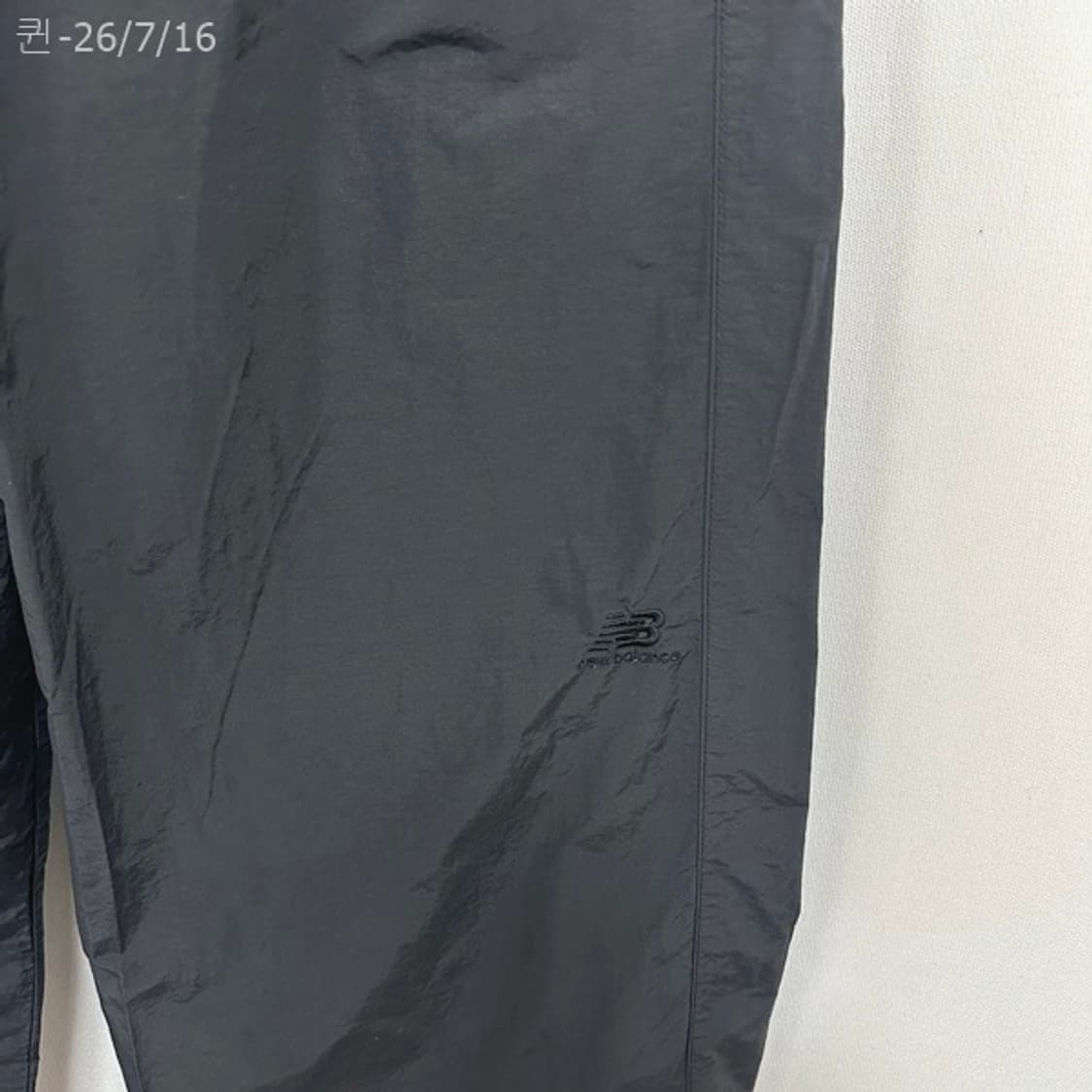 뉴발란스 여자 나일론 조거 밴딩바지 검정 70 (S) 상품이미지4
