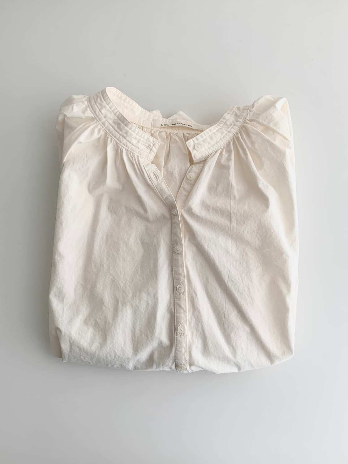 Nothing written 낫띵리튼 케이크 셔링 블라우스 상품이미지1