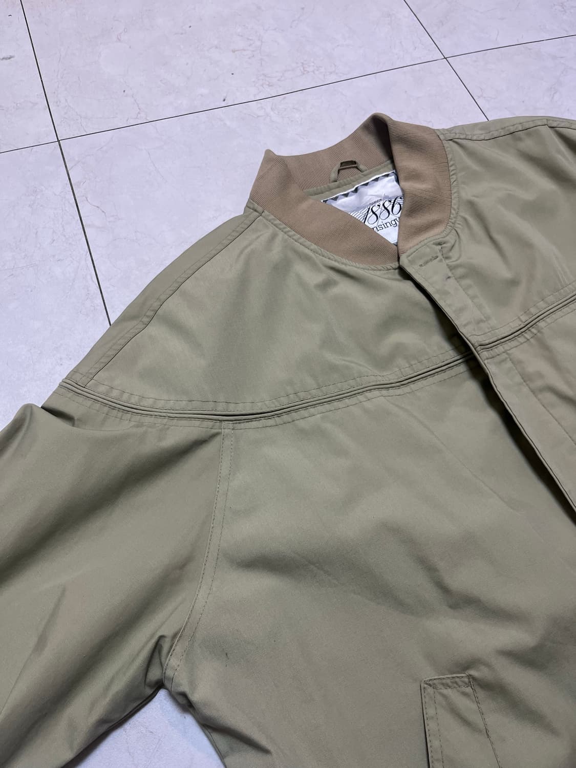 90s 먼싱웨어 munsing wear 베이지 아일렛 디테일 자켓 상품이미지1