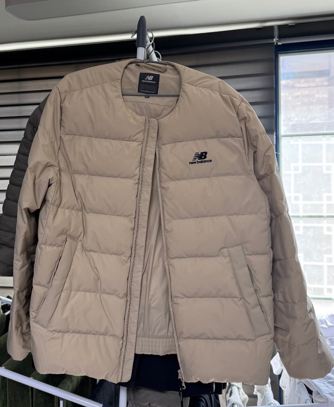 뉴발란스 경량패딩 상품이미지1
