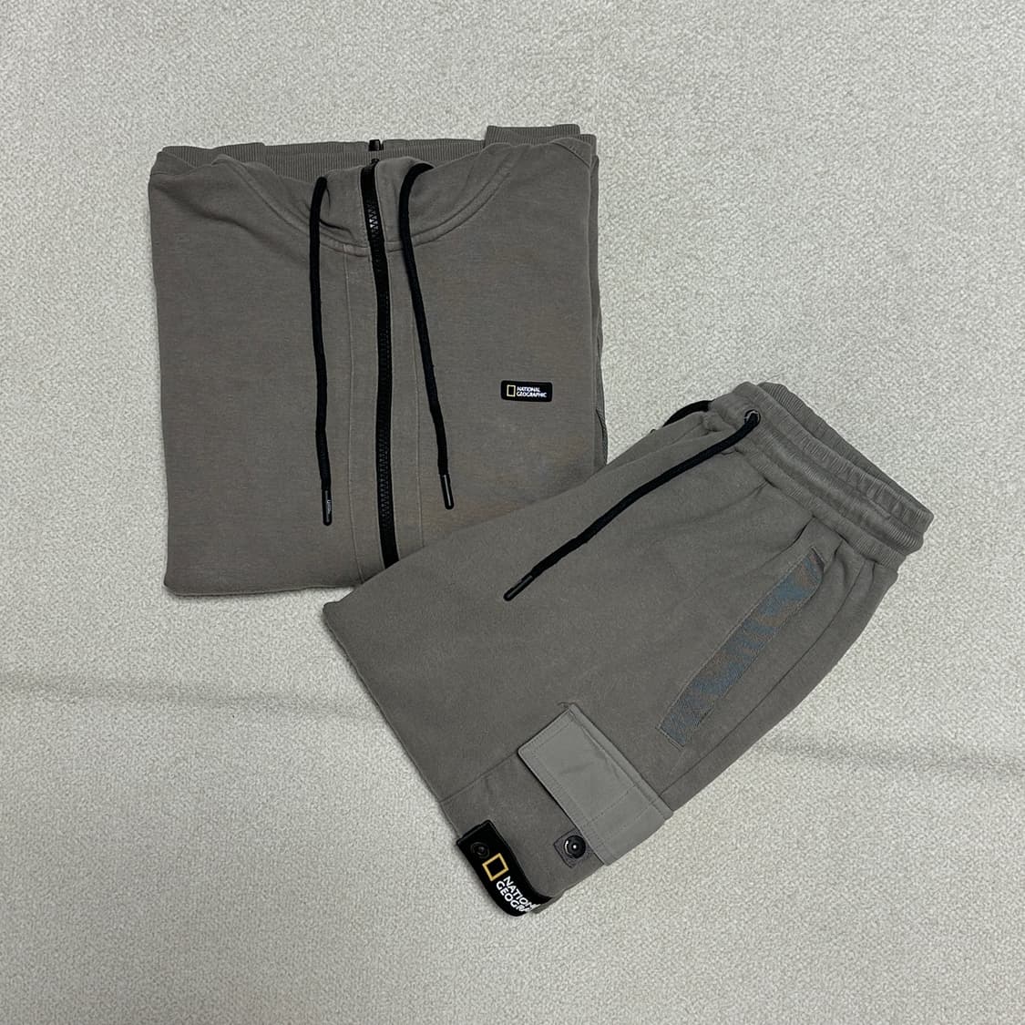 내셔널지오그래픽 슐리언 포켓 트레이닝 셋업 상품이미지1