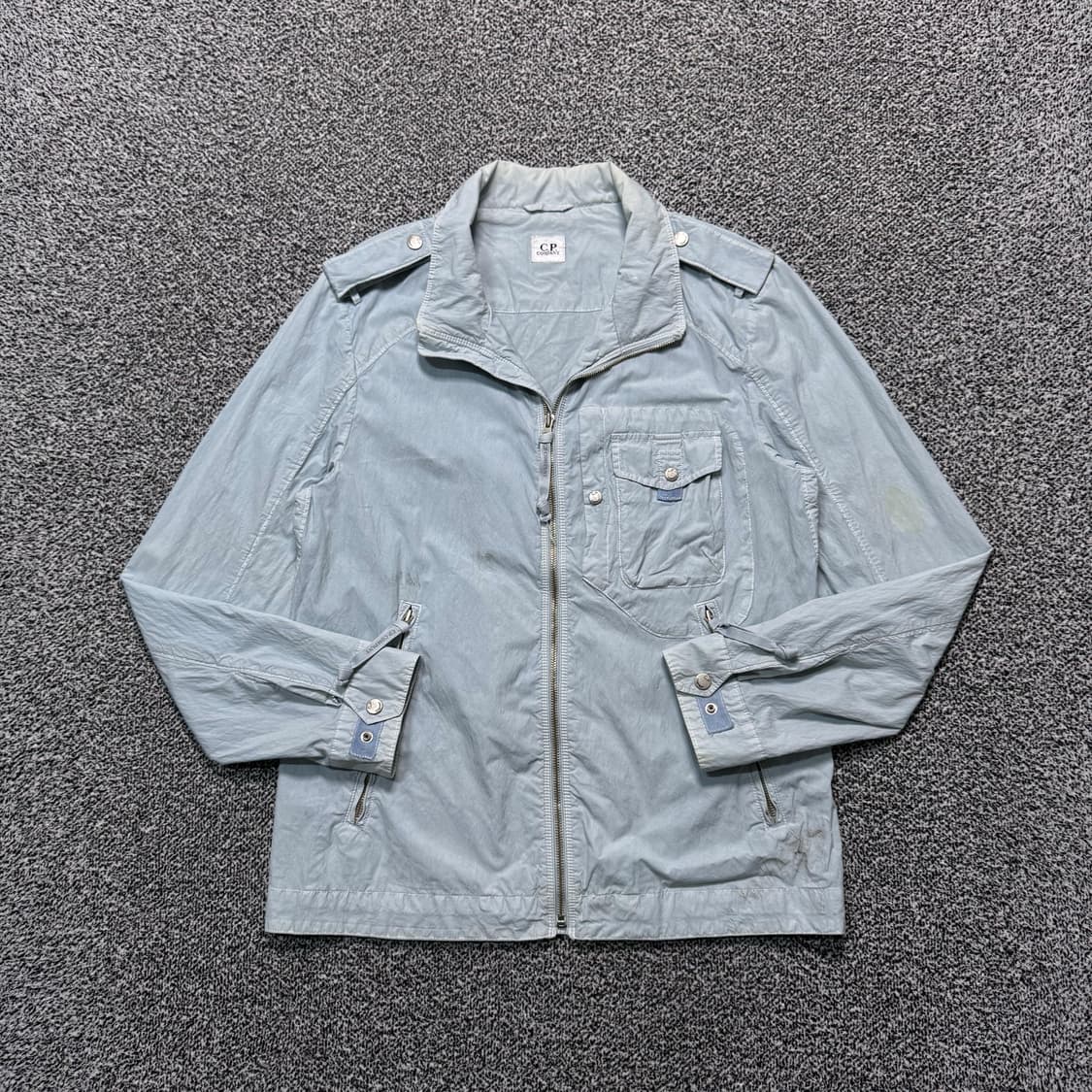 Name : C.P.컴퍼니 견장 디테일포켓 바람막이 자켓 :) 상품이미지1