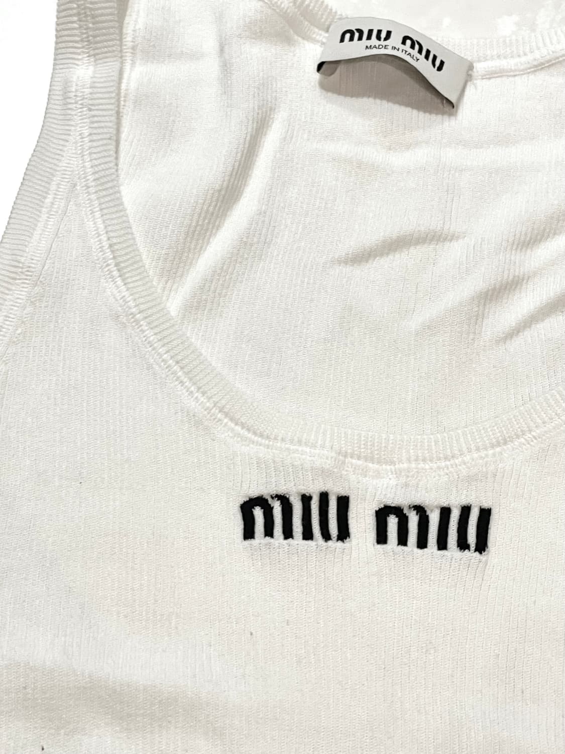 미우미우 슬리브리스 상품이미지1