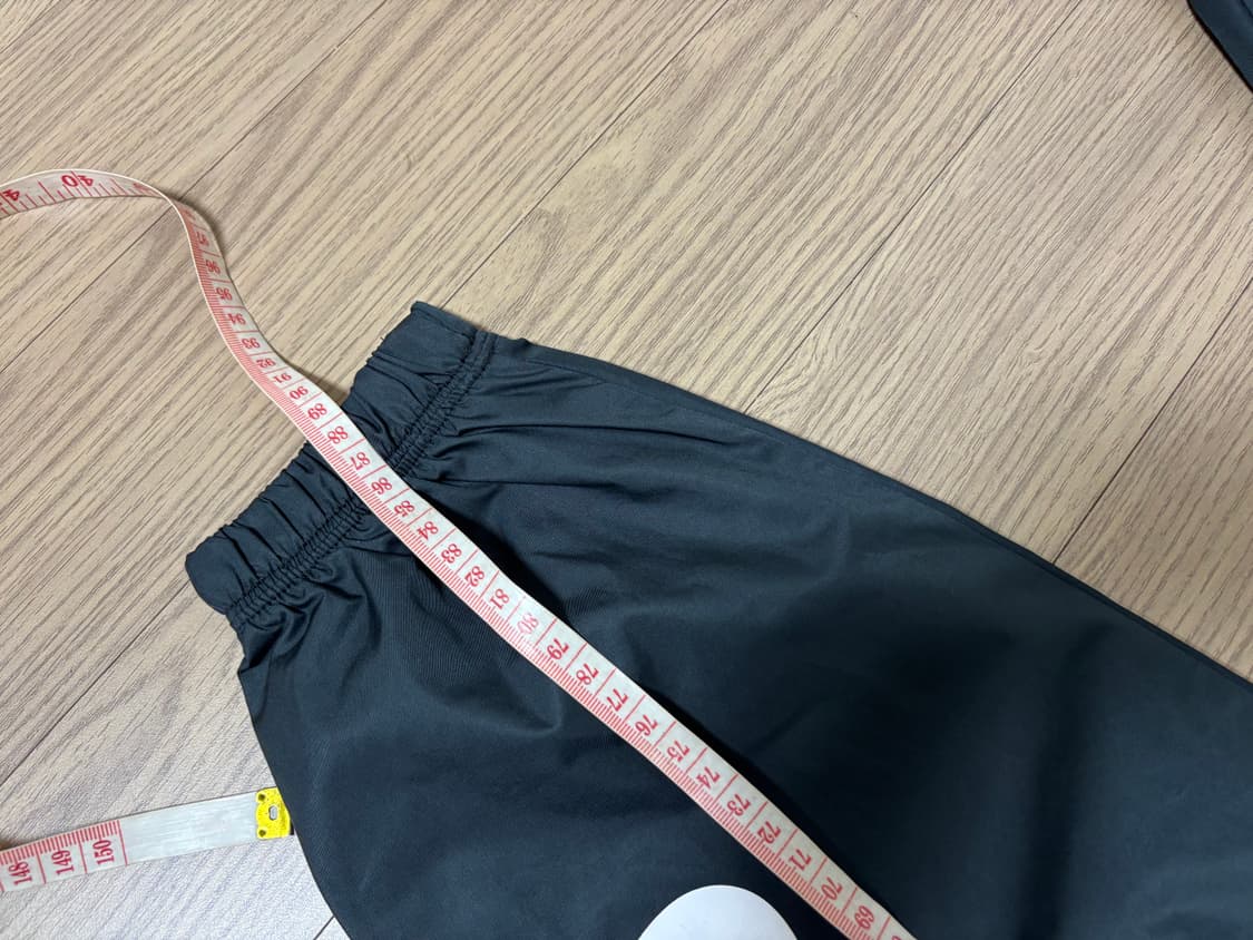 나이키 크롭 바람막이 벨트 조거팬츠세트 여성 s 실측 있어요. 상품이미지8