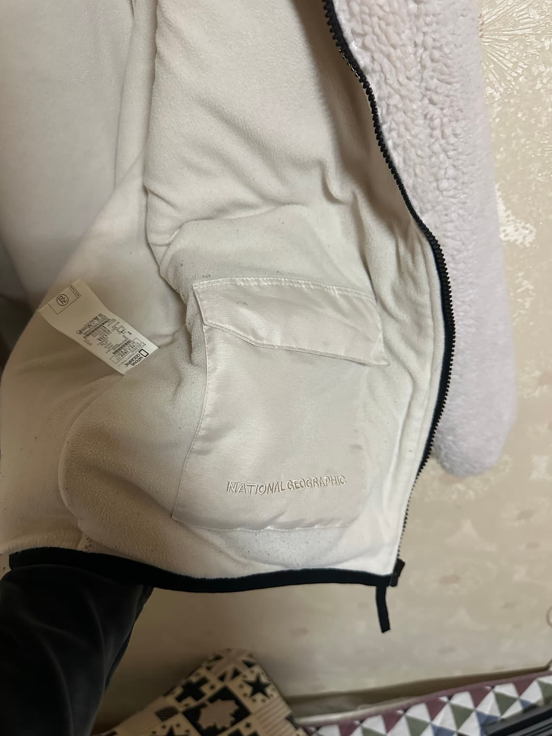 내셔널지오그래픽 뽀글이 후리스 105 아이보리 판매 상품이미지4