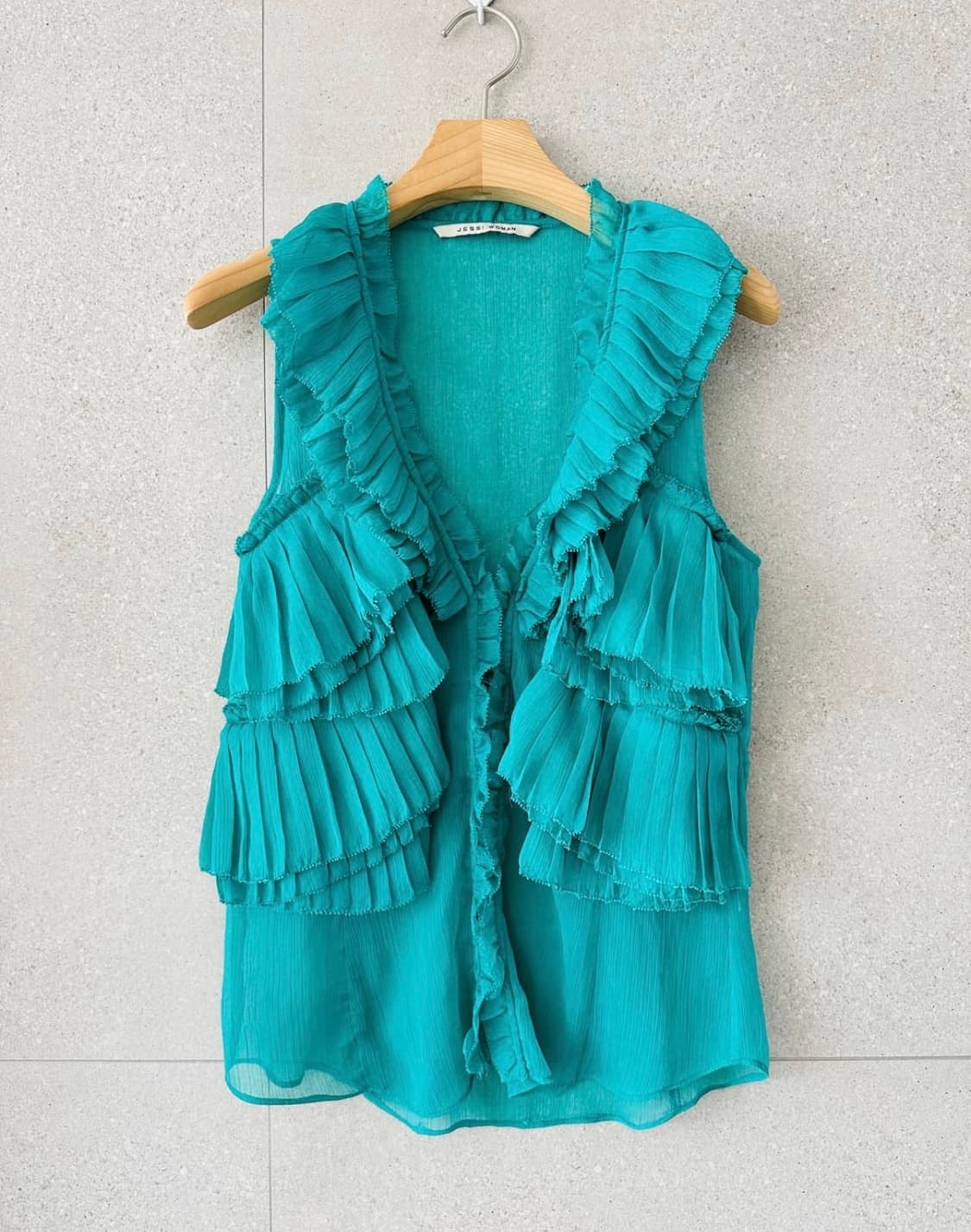 민트색 시스루 쉬폰 슬리브리스 블라우스 상품이미지1