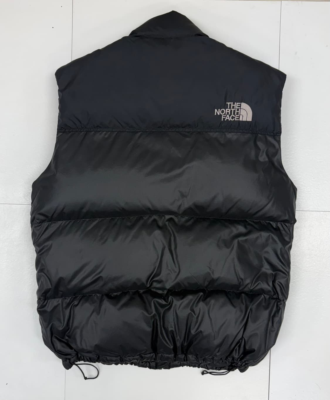 (100)노스페이스 구스다운 눕시 패딩 조끼 블랙 700 상품이미지5