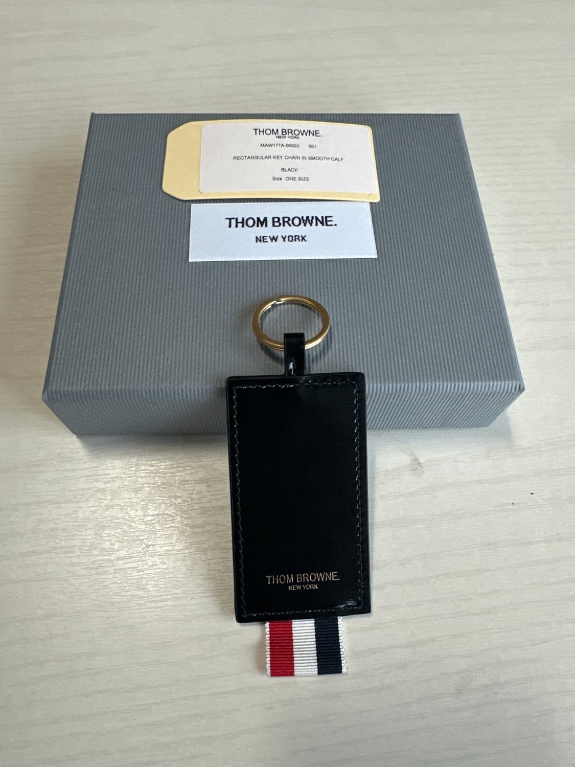 톰브라운 레더 키링 상품이미지1