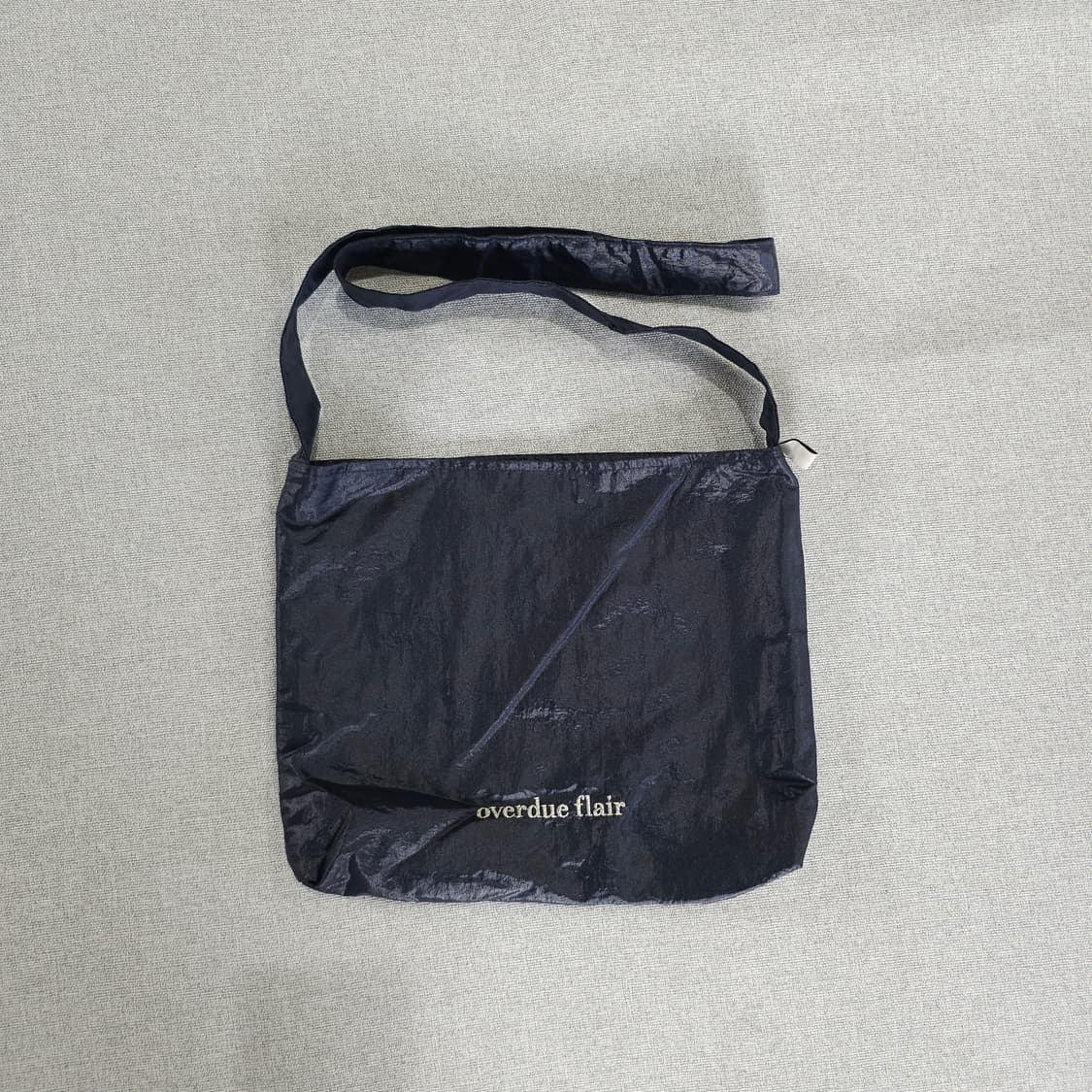 오버듀플레어 미니백 GLOSSY NAVY 상품이미지1
