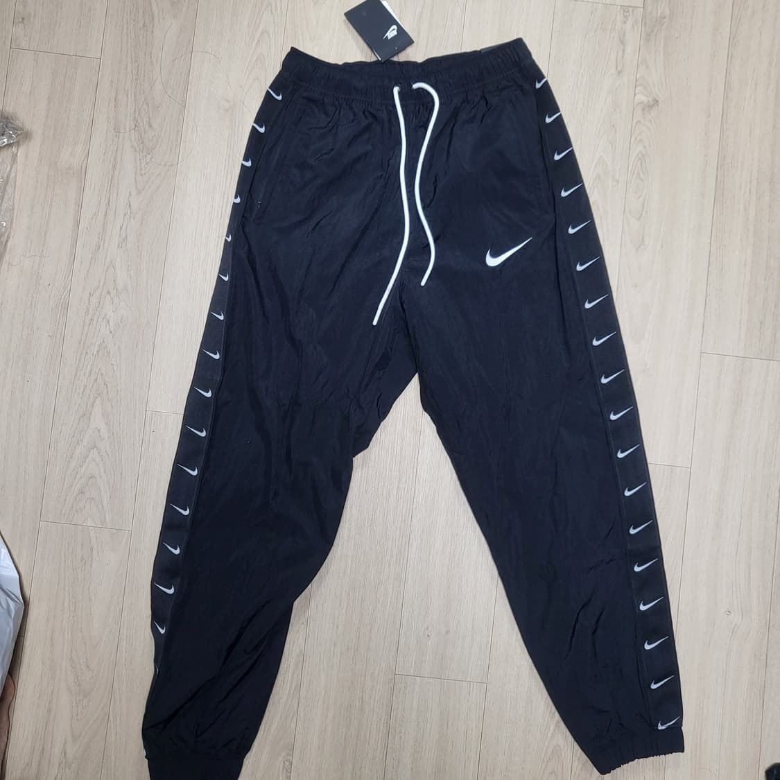 나이키 테이프스우시 팬츠 상품이미지1