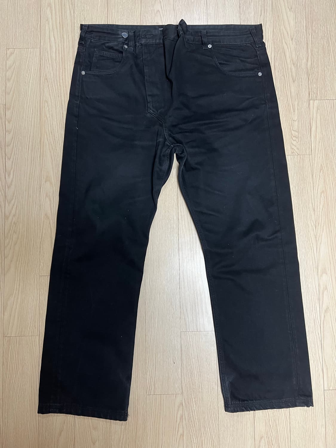 JW Anderson 블랙 팬츠 상품이미지1