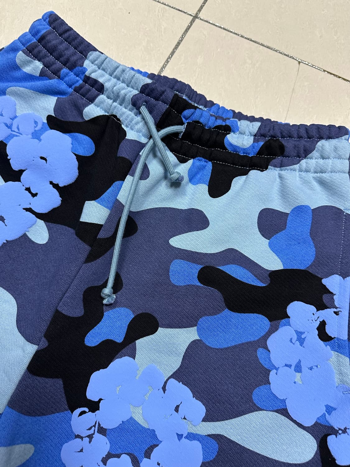 (새상품)데님티어스 블루 카모 스웻팬츠 상품이미지1