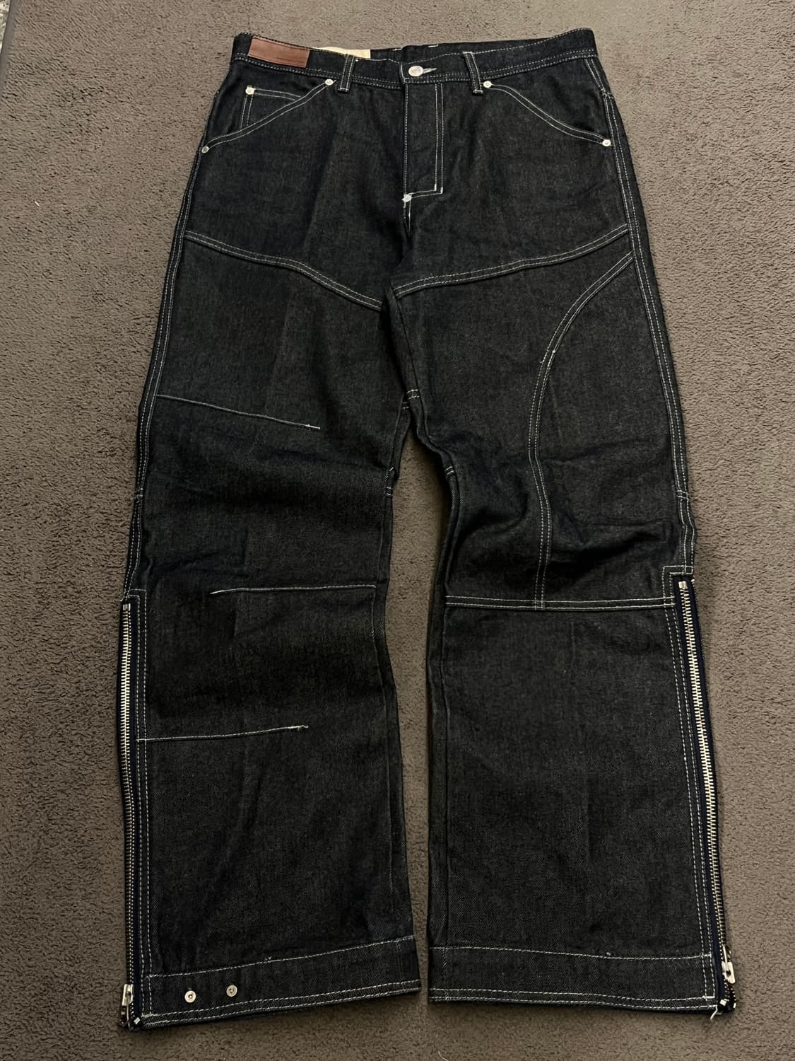 앤더슨벨 레그리지드 지퍼 와이드 팬츠 처분  상품이미지1