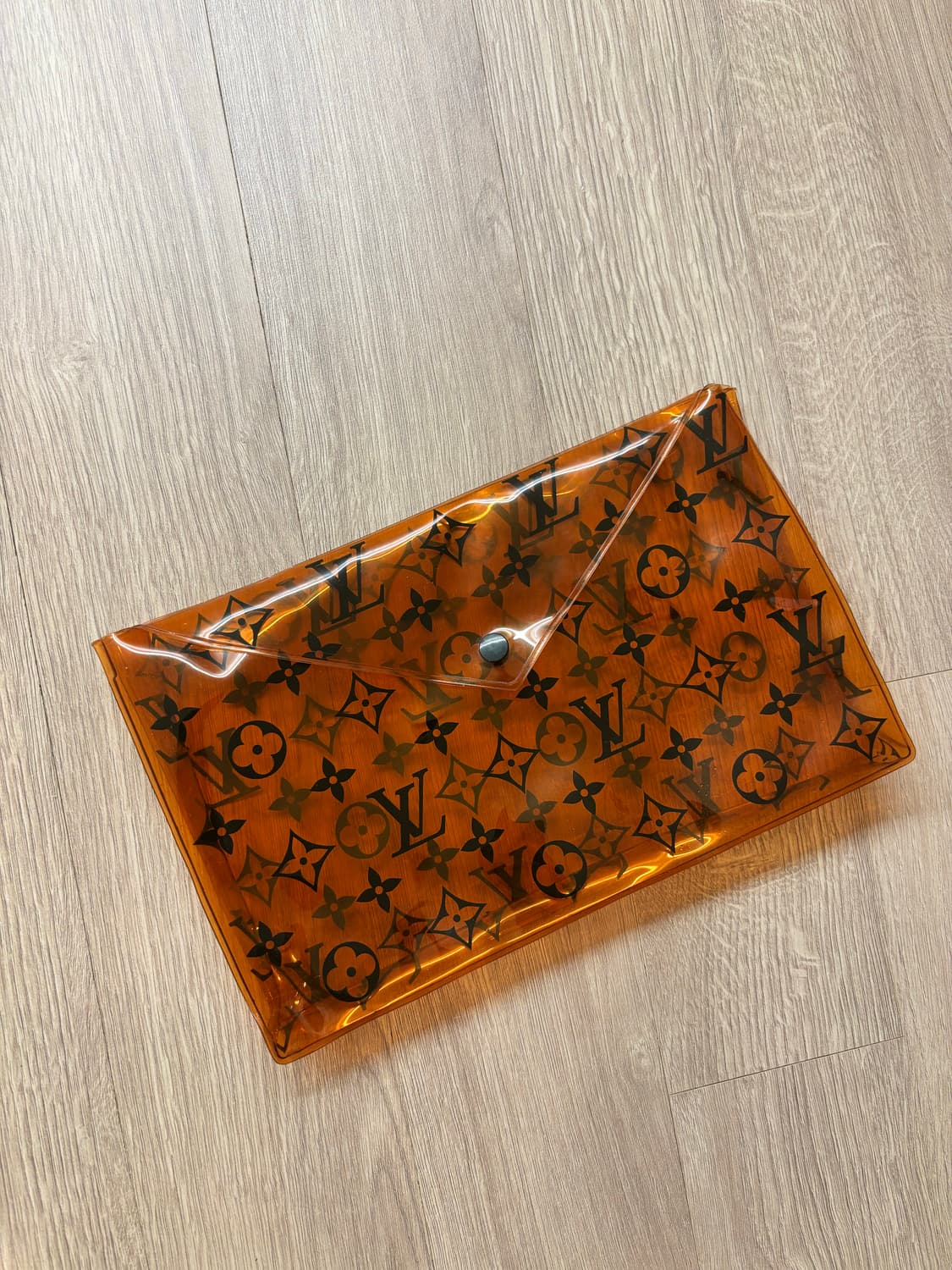 루이비통 오렌지 모노그램 PVC 봉투 파우치 상품이미지1