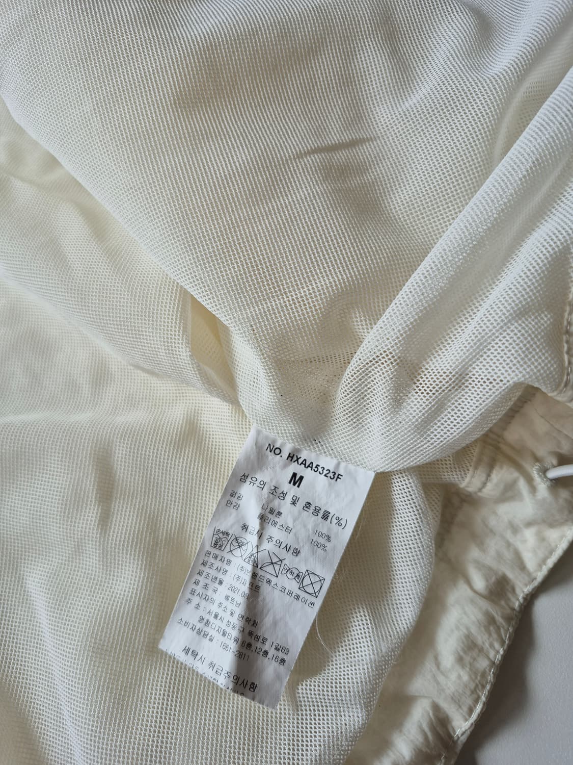 젝시믹스 아이보리 바람막이 후드 집업 상품이미지7