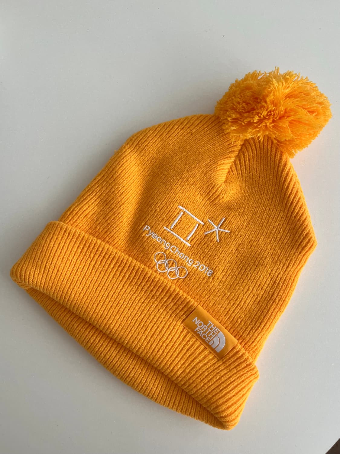 노스페이스 평창올림픽 방울 비니 귤색 상품이미지1