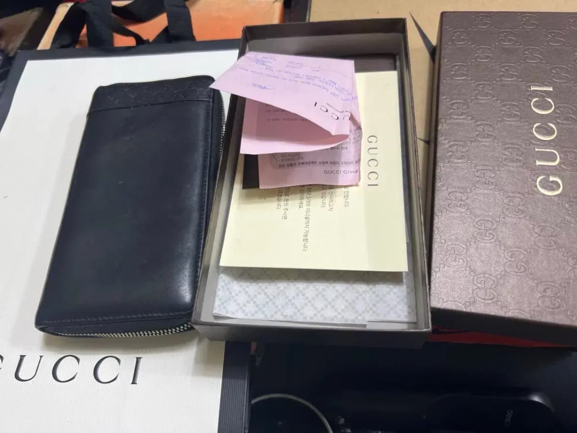 구찌 블랙 지퍼 돌이 시마 장지갑 상품이미지1