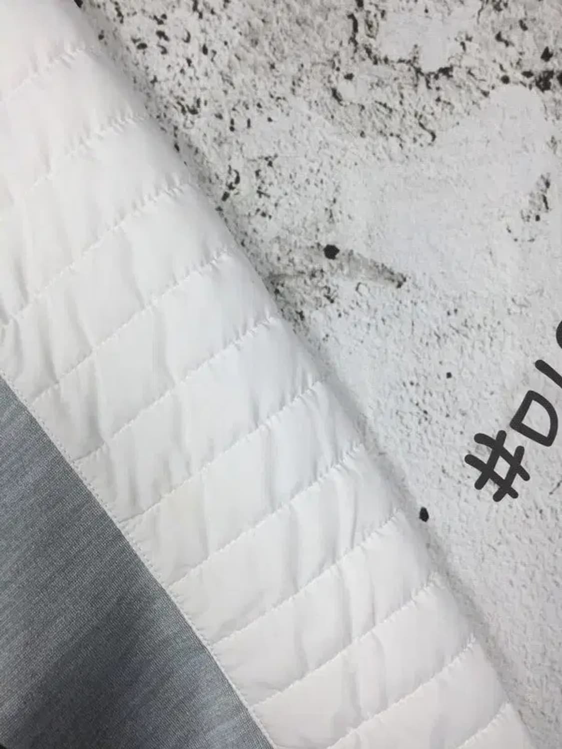 디스커버리 여성 경량 패딩 자켓 화이트 95 3400158 상품이미지10