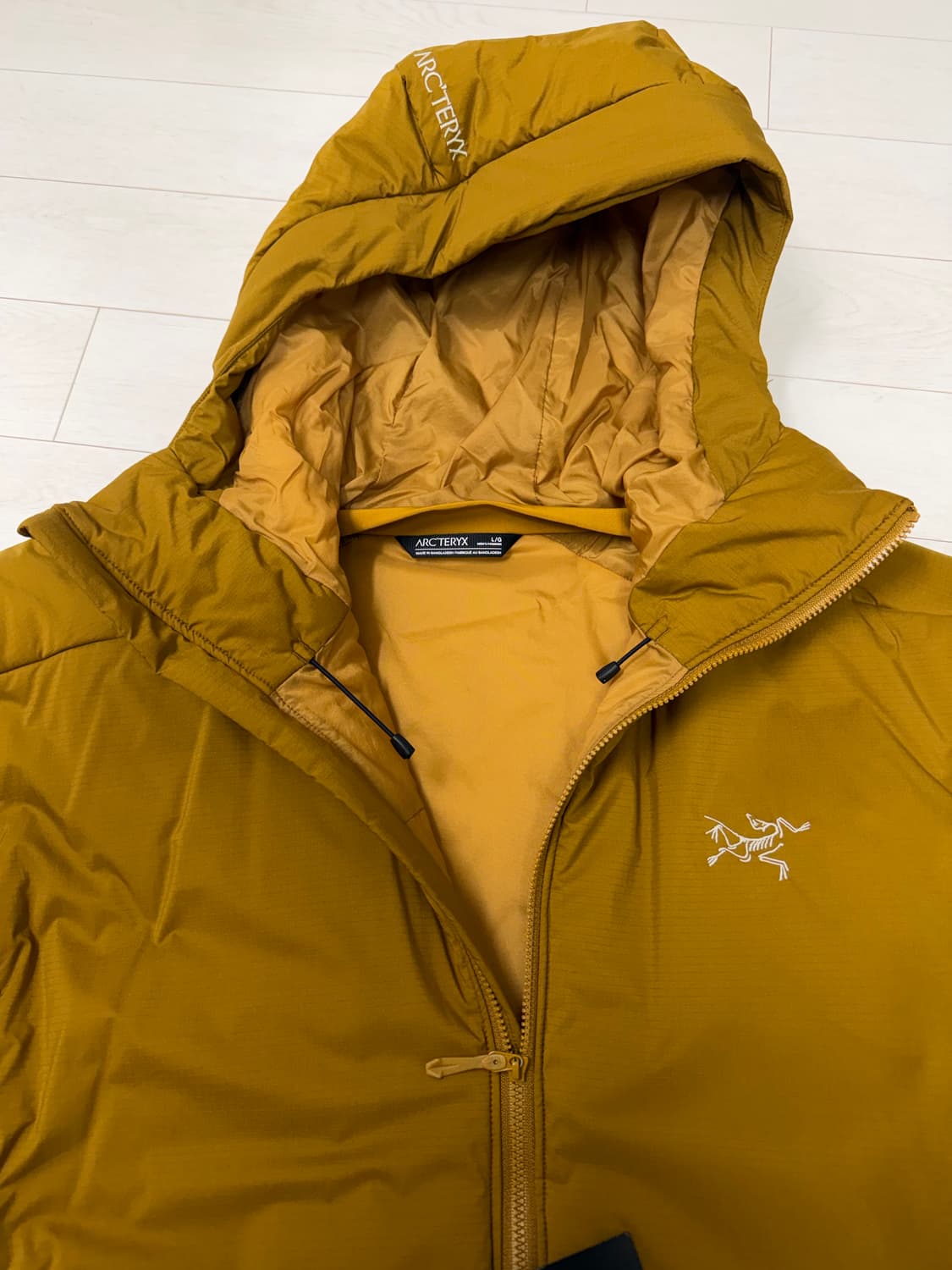 아크테릭스 아톰 헤비웨이트 유콘 후디 L 사이즈  상태 9.8/10 세탁 상품이미지5