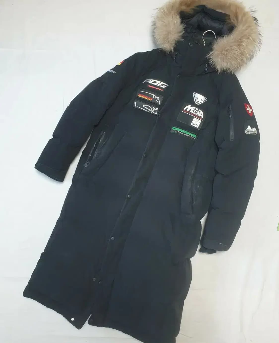 다이나핏 블랙 라쿤 구스다운 롱패딩 상품이미지1