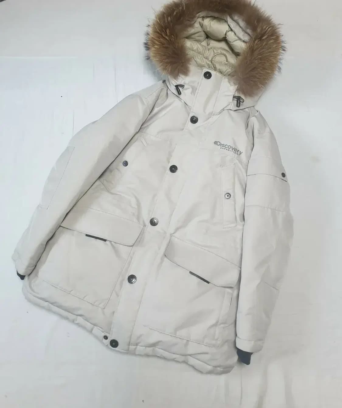 디스커버리 아이보리 라쿤퍼 다운 패딩 상품이미지1