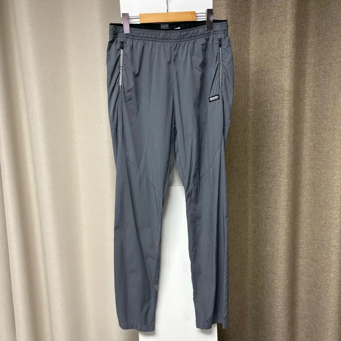 디스커버리 트레이닝 팬츠 32 상품이미지1