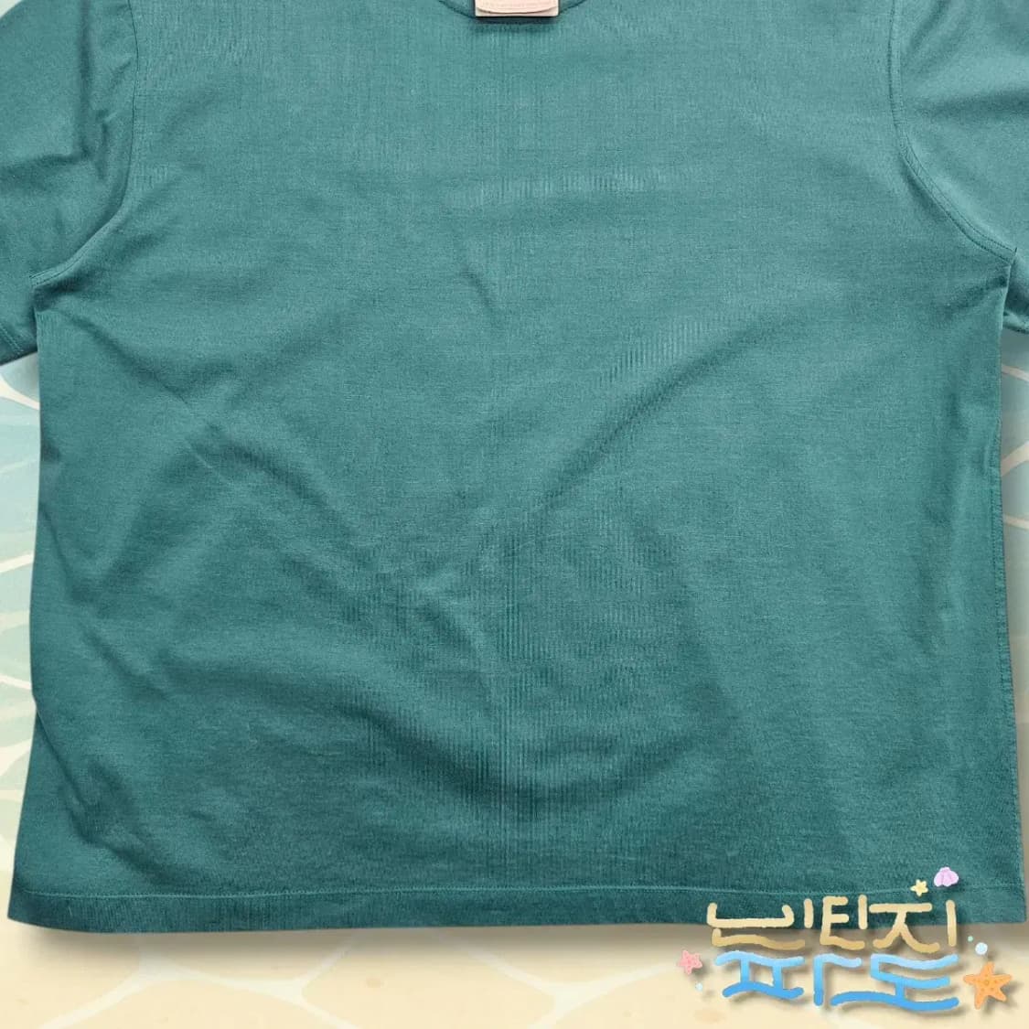 48 우영미 22FW 그린 코튼 레더 라벨 티셔츠 상품이미지9