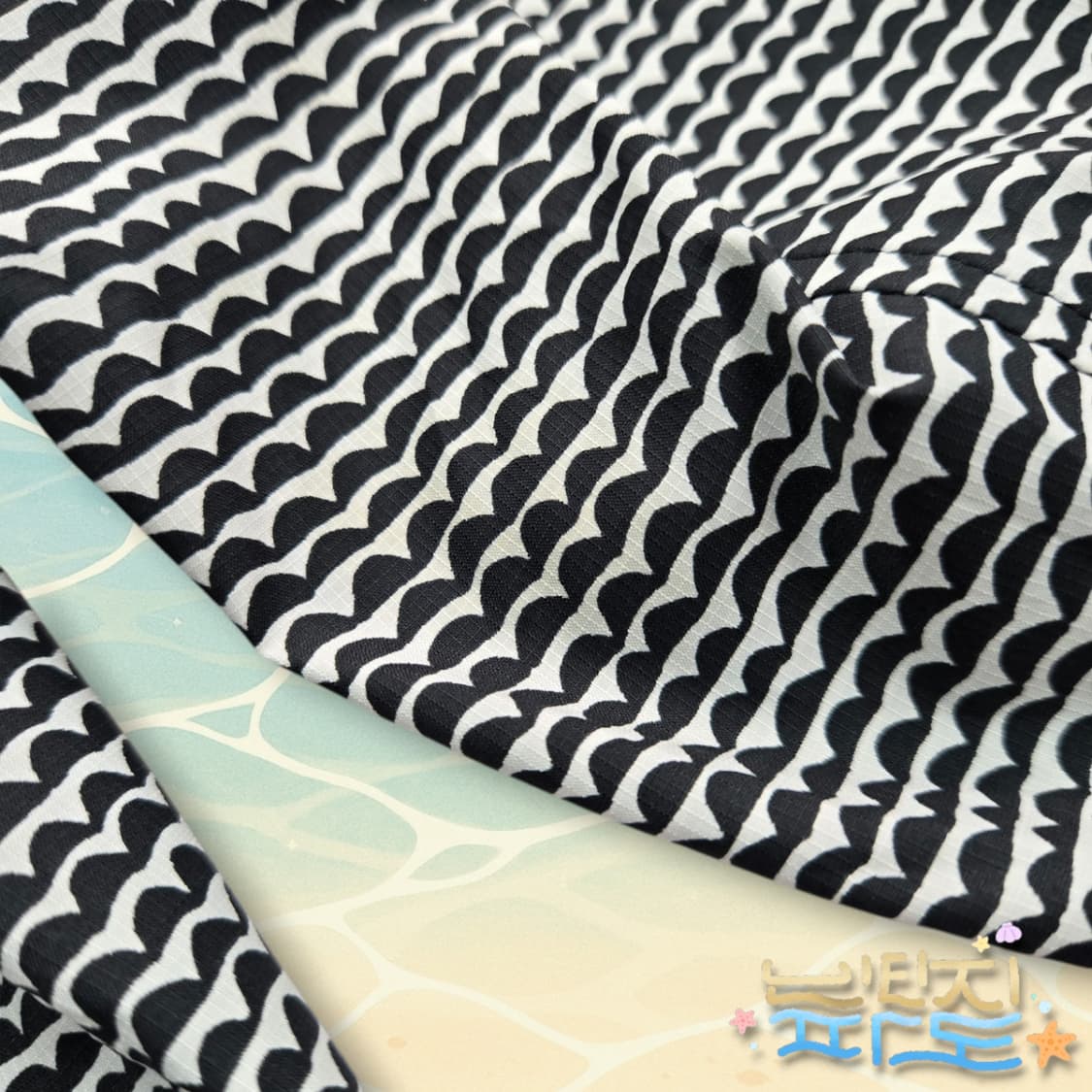 M 메리메꼬 유니클로 롱 바람막이 자켓 상품이미지9