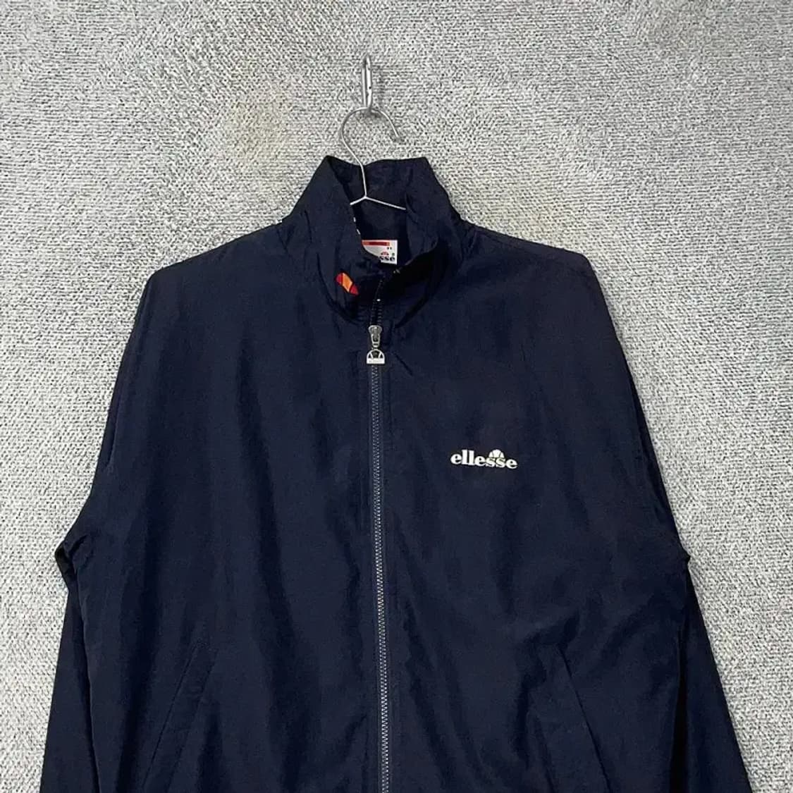 엘레쎄 네이비 로고 오버핏 바람막이 95 상품이미지3