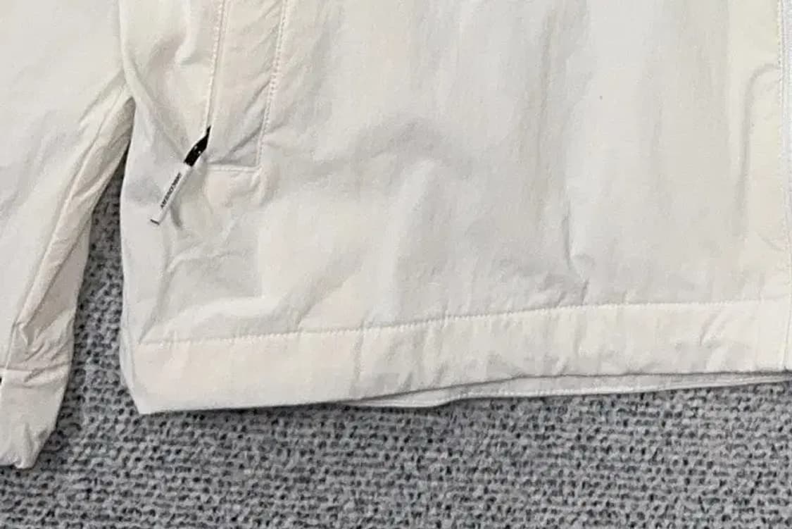 디스커버리 크림 로고 기능성 후드 바람막이 105 상품이미지5