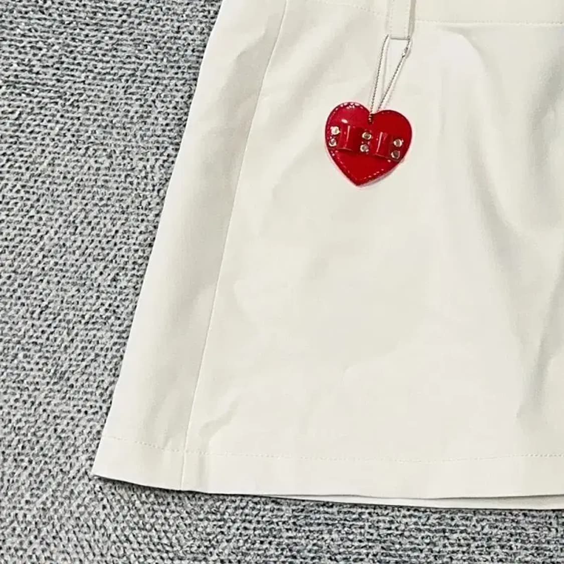 먼싱웨어 로고 화이트 기능성 스커트 67-94 상품이미지4