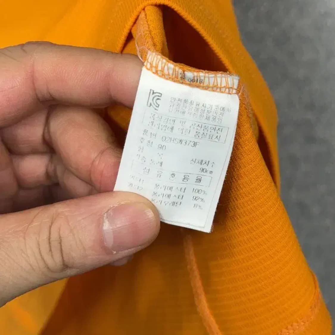 휠라 로고 여성 오렌지 반집업 카라티 90 상품이미지6