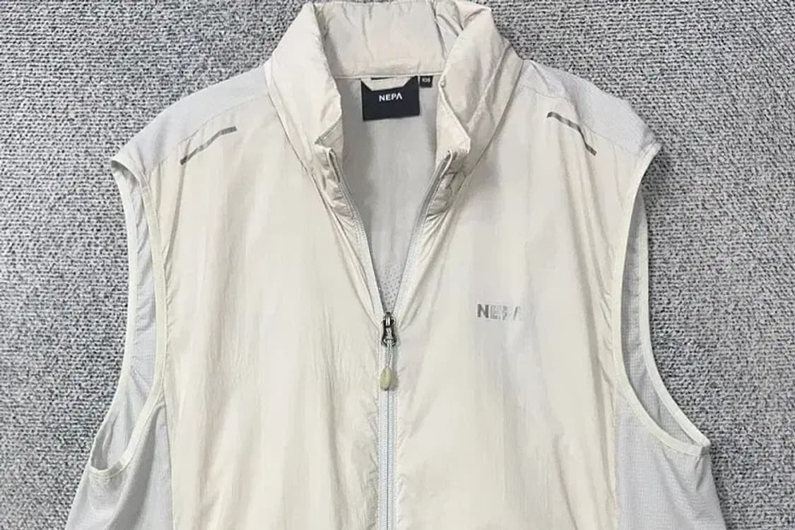 네파 크림 화이트 바람막이 조끼 105 상품이미지3