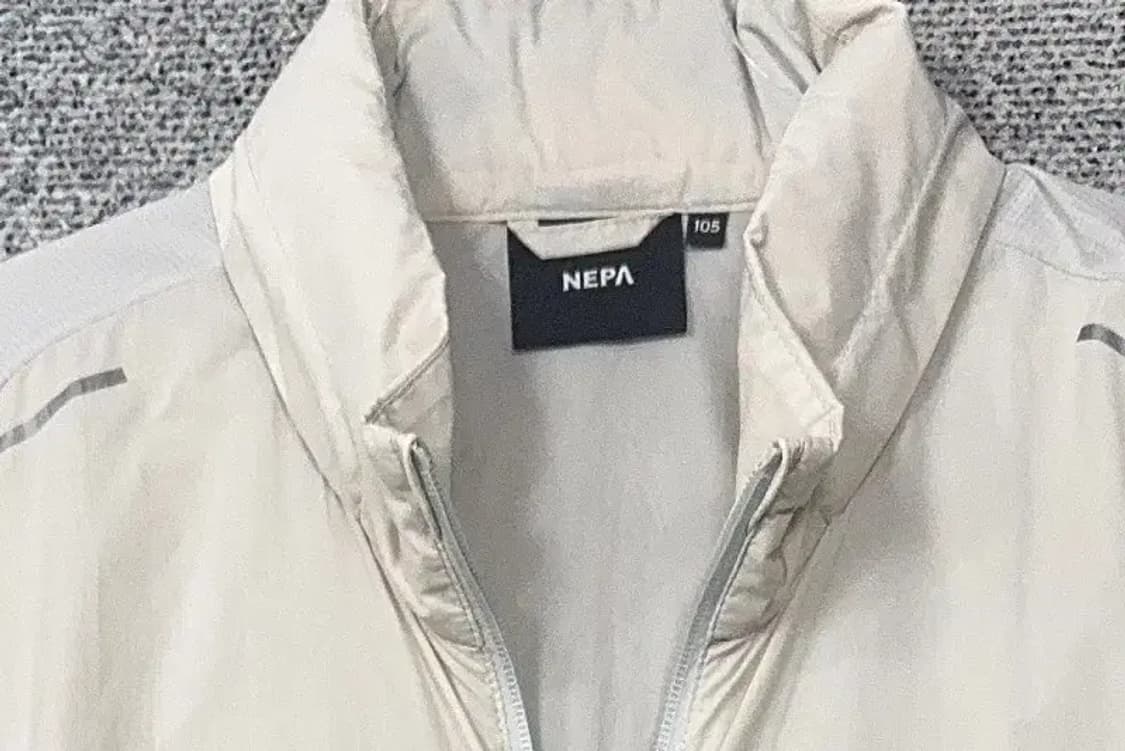 네파 크림 화이트 바람막이 조끼 105 상품이미지5