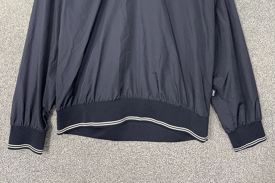 휠라 네이비 로고 바람막이 웜업 105 상품이미지4