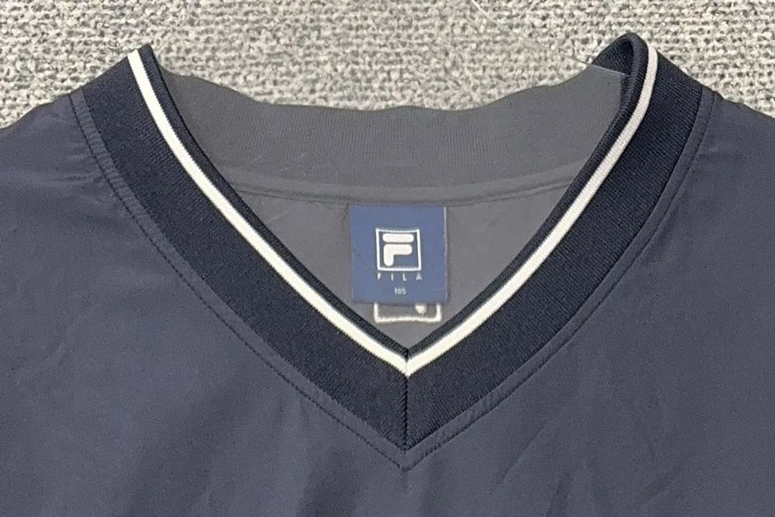 휠라 네이비 로고 바람막이 웜업 105 상품이미지5