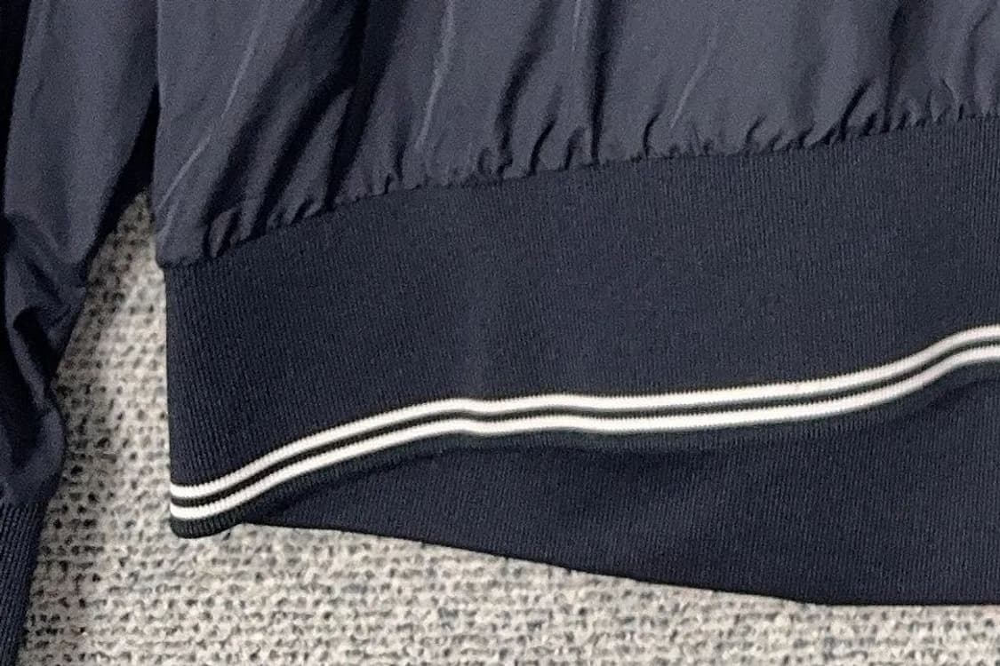 휠라 네이비 로고 바람막이 웜업 105 상품이미지7