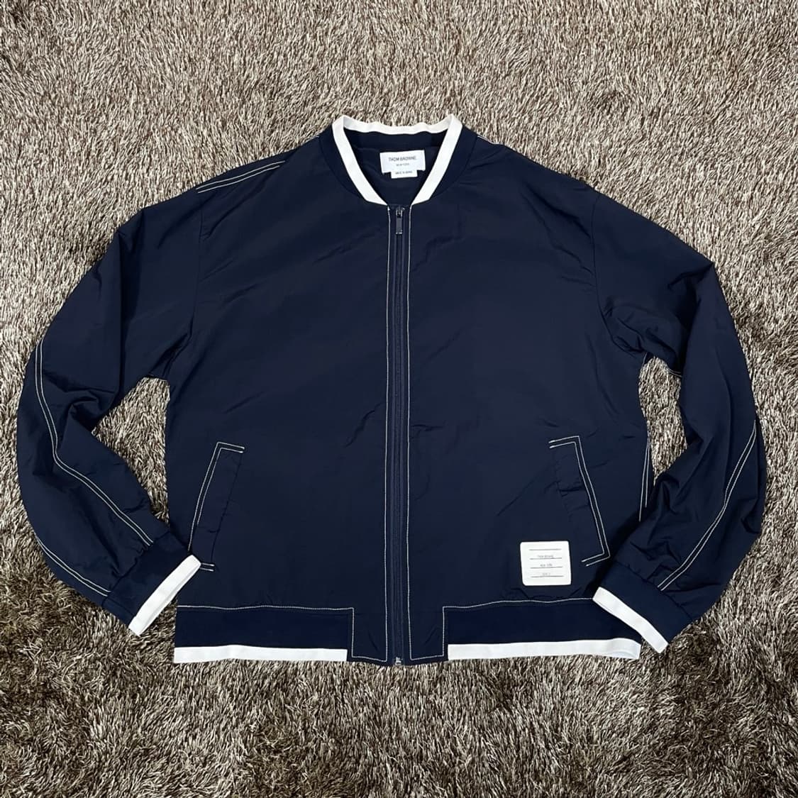 톰 브라운 Thom Browne 네이비 배색 봄버 자켓 3 상품이미지1