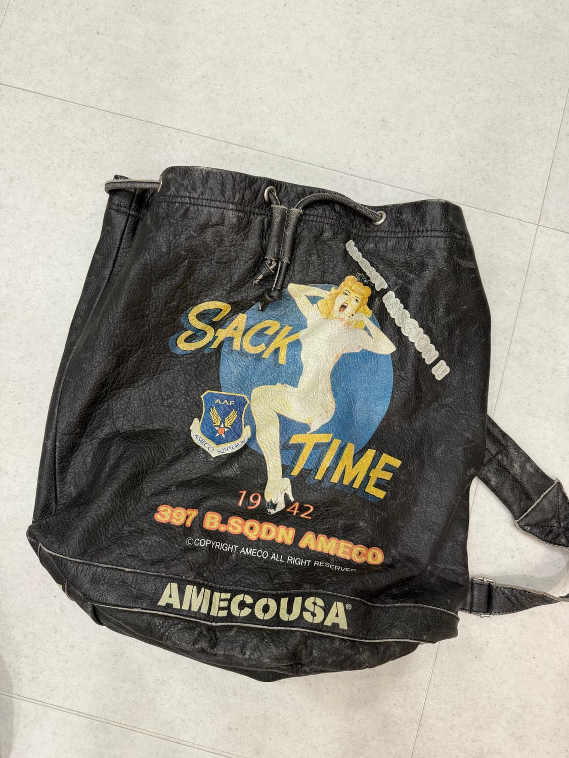 아메코 AMECO 핀업걸 가죽 드로스트링 백팩 상품이미지1