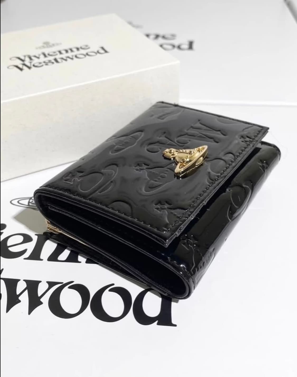 비비안웨스트우드 아카이브 금장 orb 펀칭 유광 블랙레더 하프월렛 반지갑 상품이미지3
