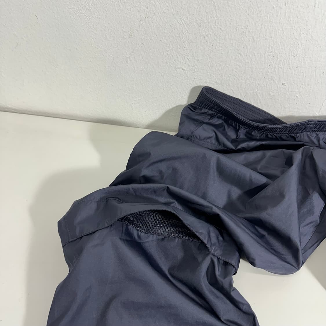 우먼M-L 나이키 다크네이비 레귤러핏 바람막이 팬츠 상품이미지7