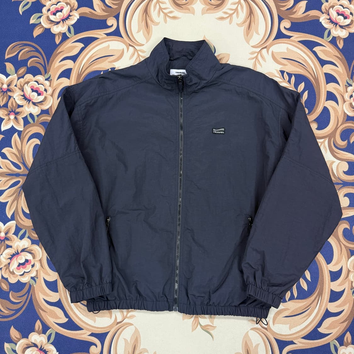 (M)트래블 TRAVEL 스몰로고 우븐 바람막이자켓(블랙) 상품이미지1