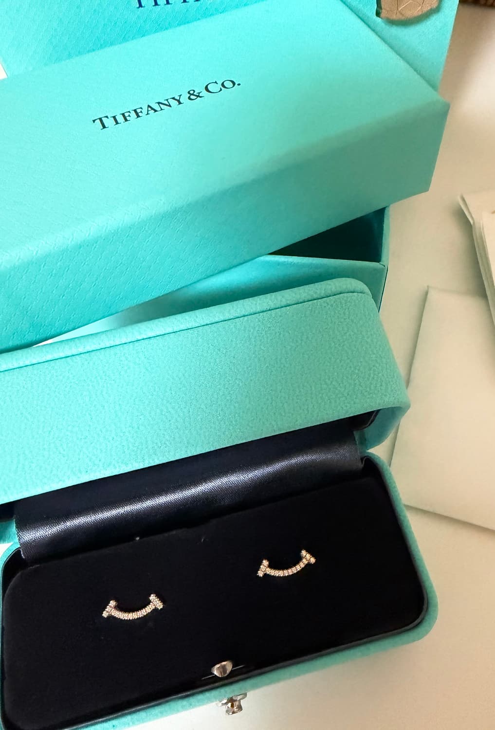 티파니앤코 T 스마일 미니 다이아 이어링 상품이미지1