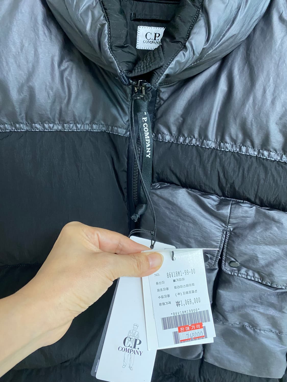 cp컴퍼니 24fw 에코크롬 패딩조끼 L사이즈 상품이미지4