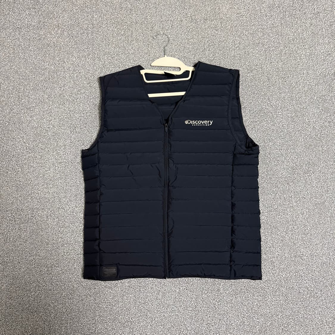 디스커버리 경량 패딩조끼 네이비 100 상품이미지1