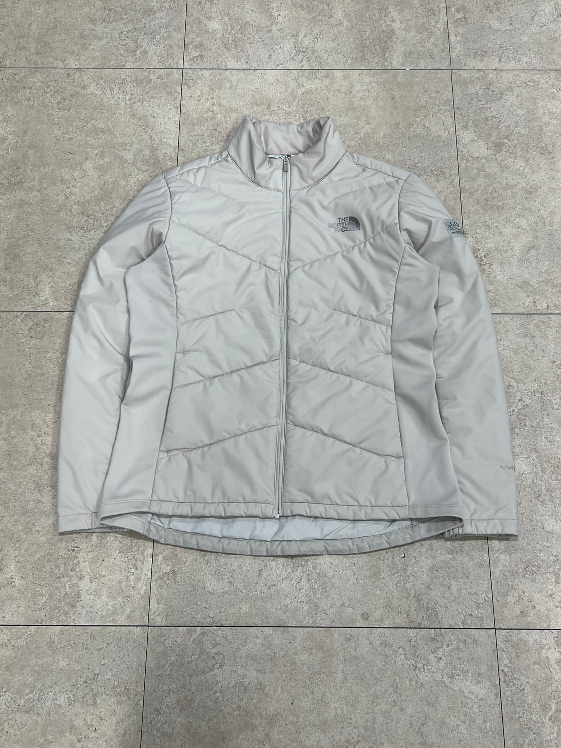 노스페이스 우먼스 화이트라벨 스피릿 브이모션 자켓 베이지 상품이미지2